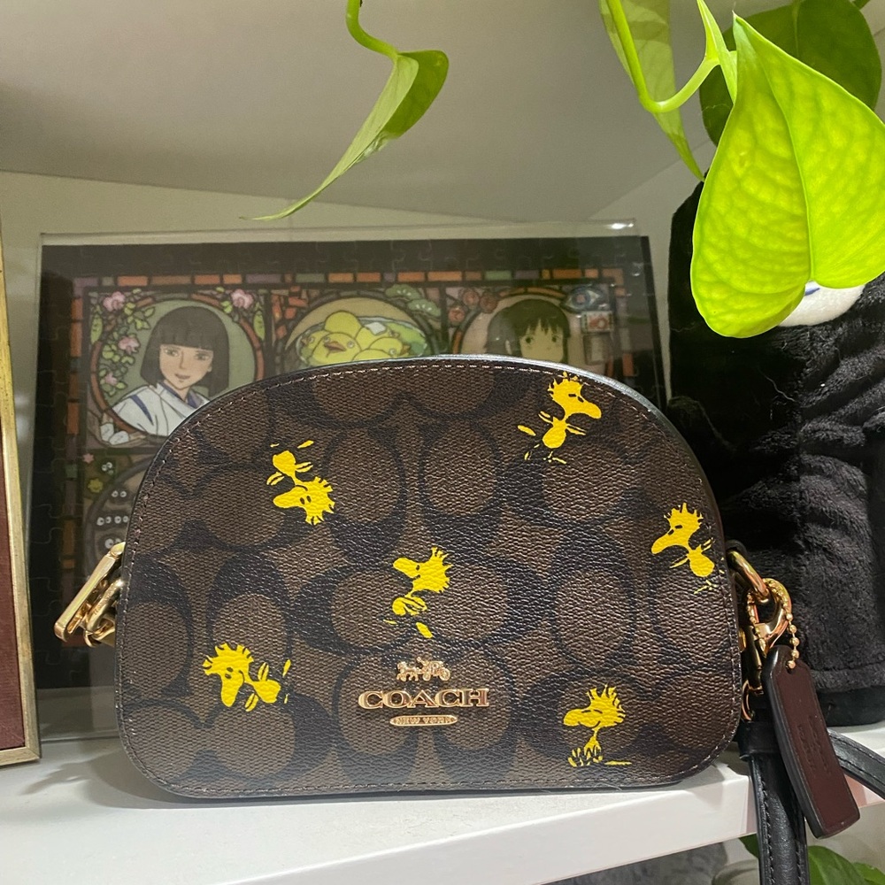 Coach X Peanuts Mini Serena Brown Black Signature Canvas Woodstock Crossbody Bag